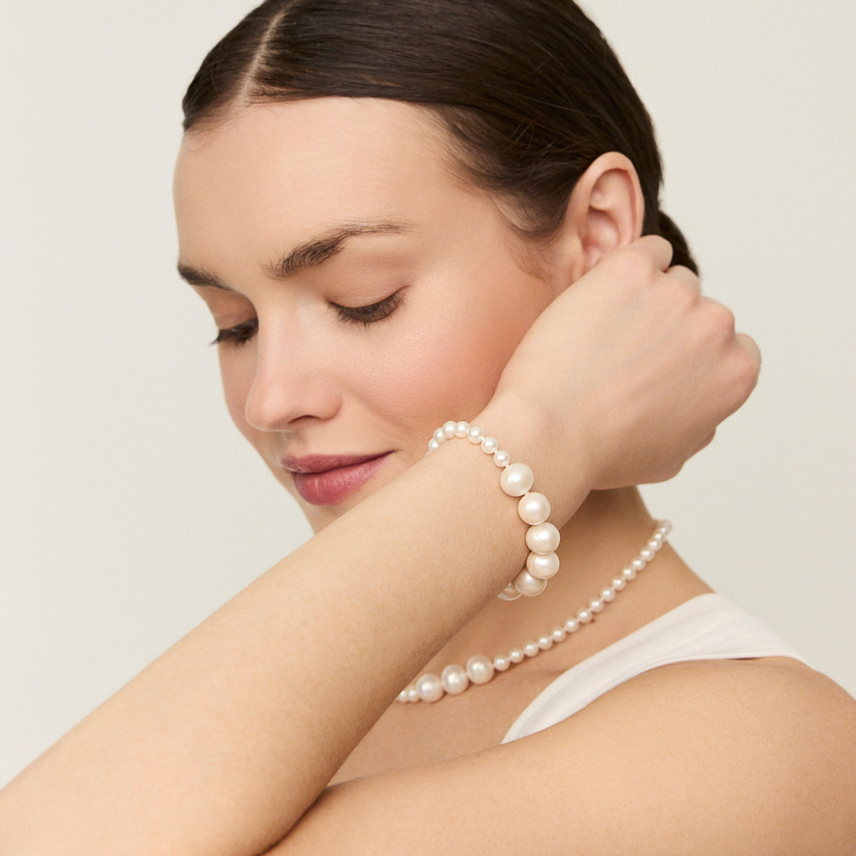 Pozlacený stříbrný náramek s perlami